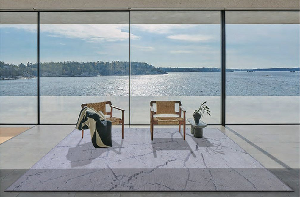 พรมตกแต่งลายกราฟิกเรขาคณิตโทนฟ้าหม่น Minimalist Living Room Rug in Muted Blue Graphic Design